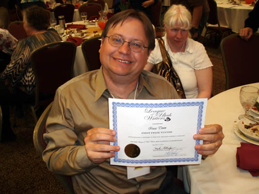 with his first place certificate for non-rhyming poetry.